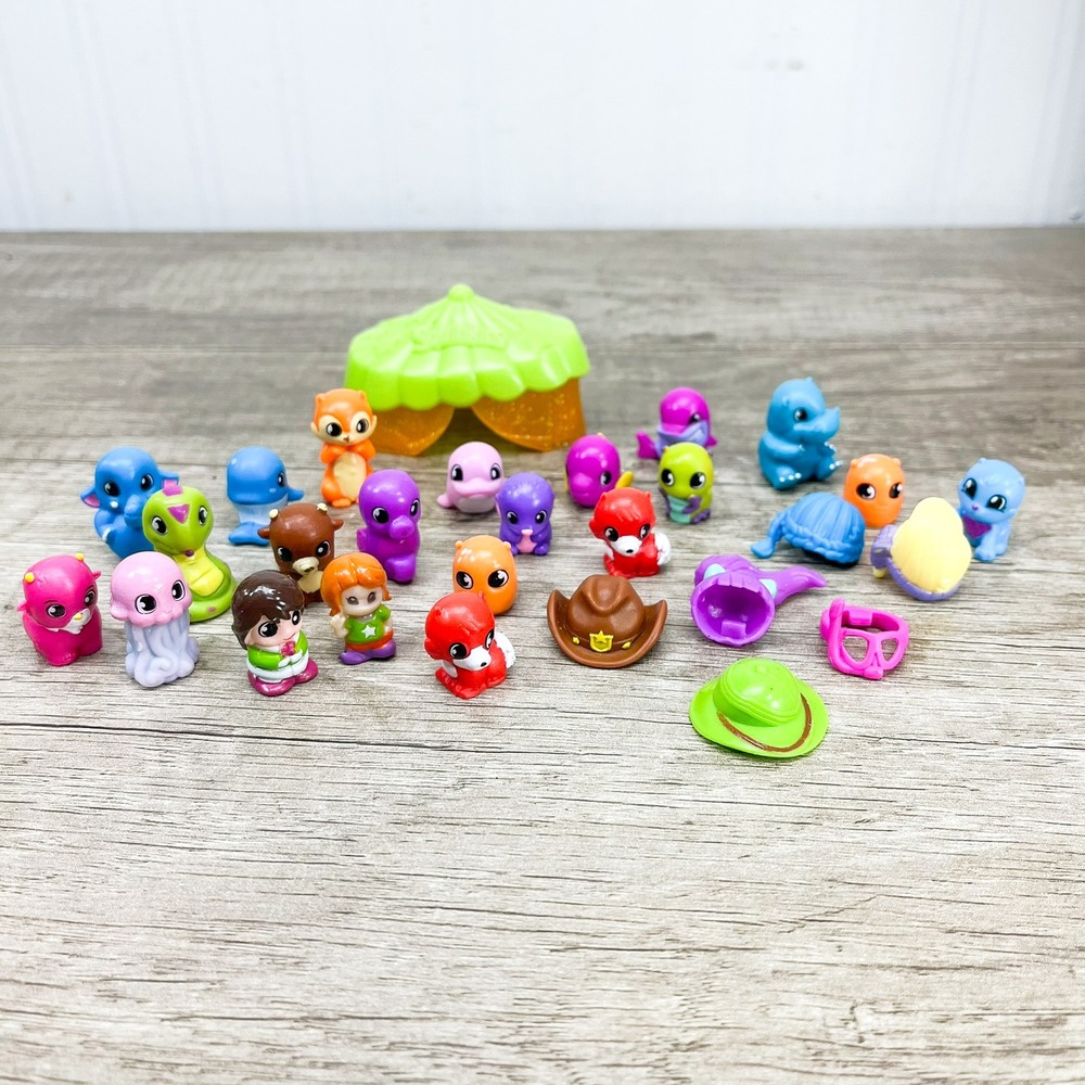 Squinkies Lot of 21 Figures and Accessories Animals People Tent Cowboy Hat
